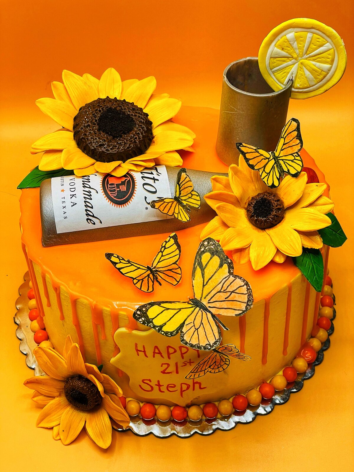 sunflower and butterfly cake