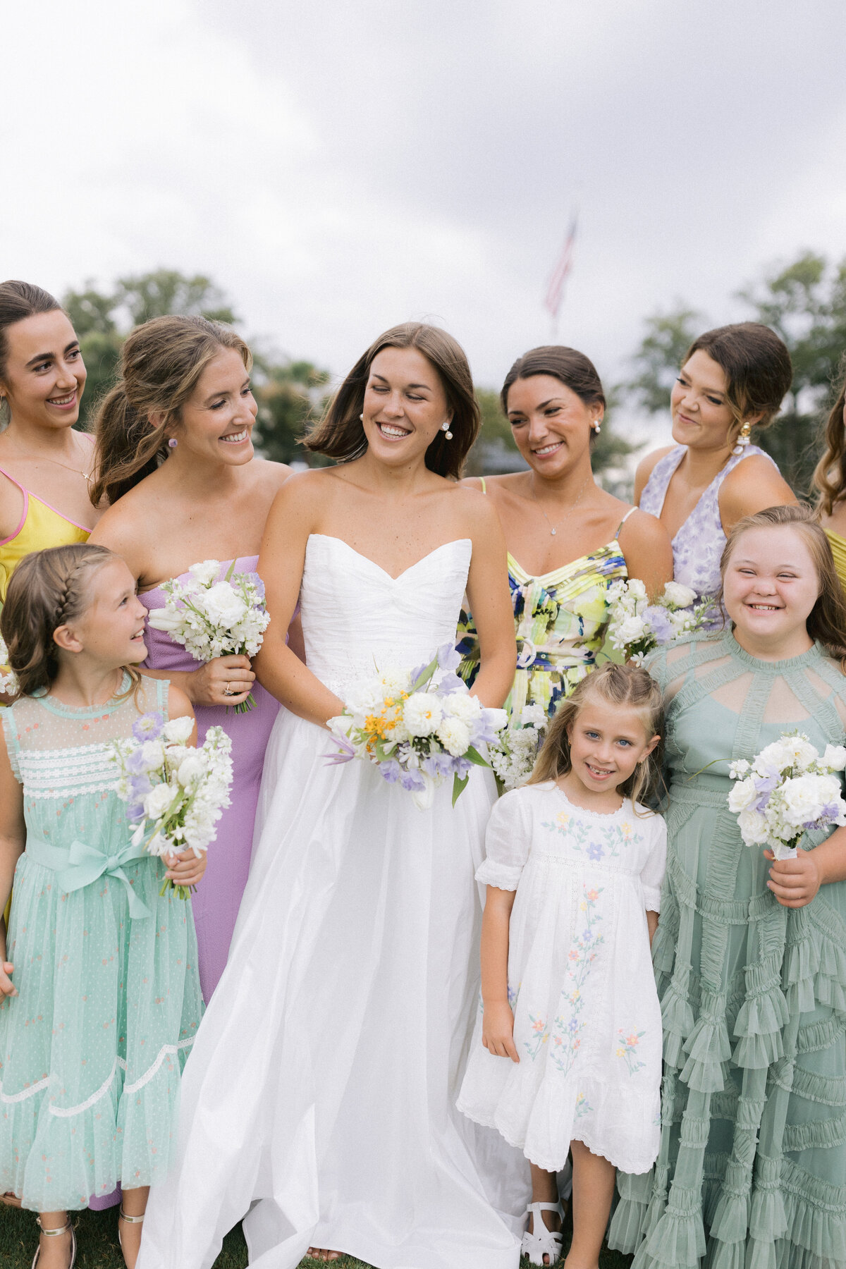 a bride standing with her bridal party 