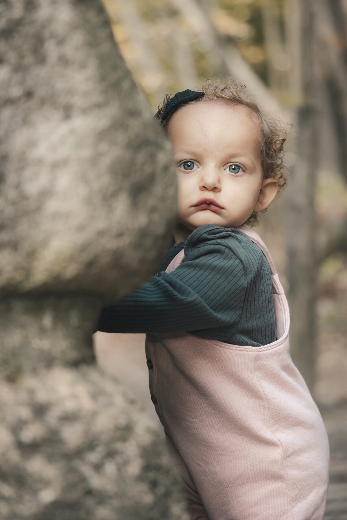 a beautiful baby with blue eyes. taken during a family photo session at richfield park in Davison, MI 