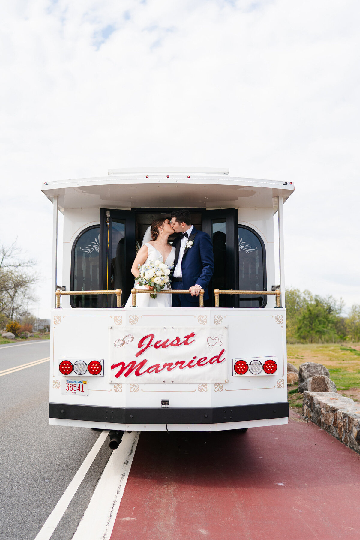 Gloucester MA Cruiseport wedding featuring romantic oceanside portraits and candid moments.
