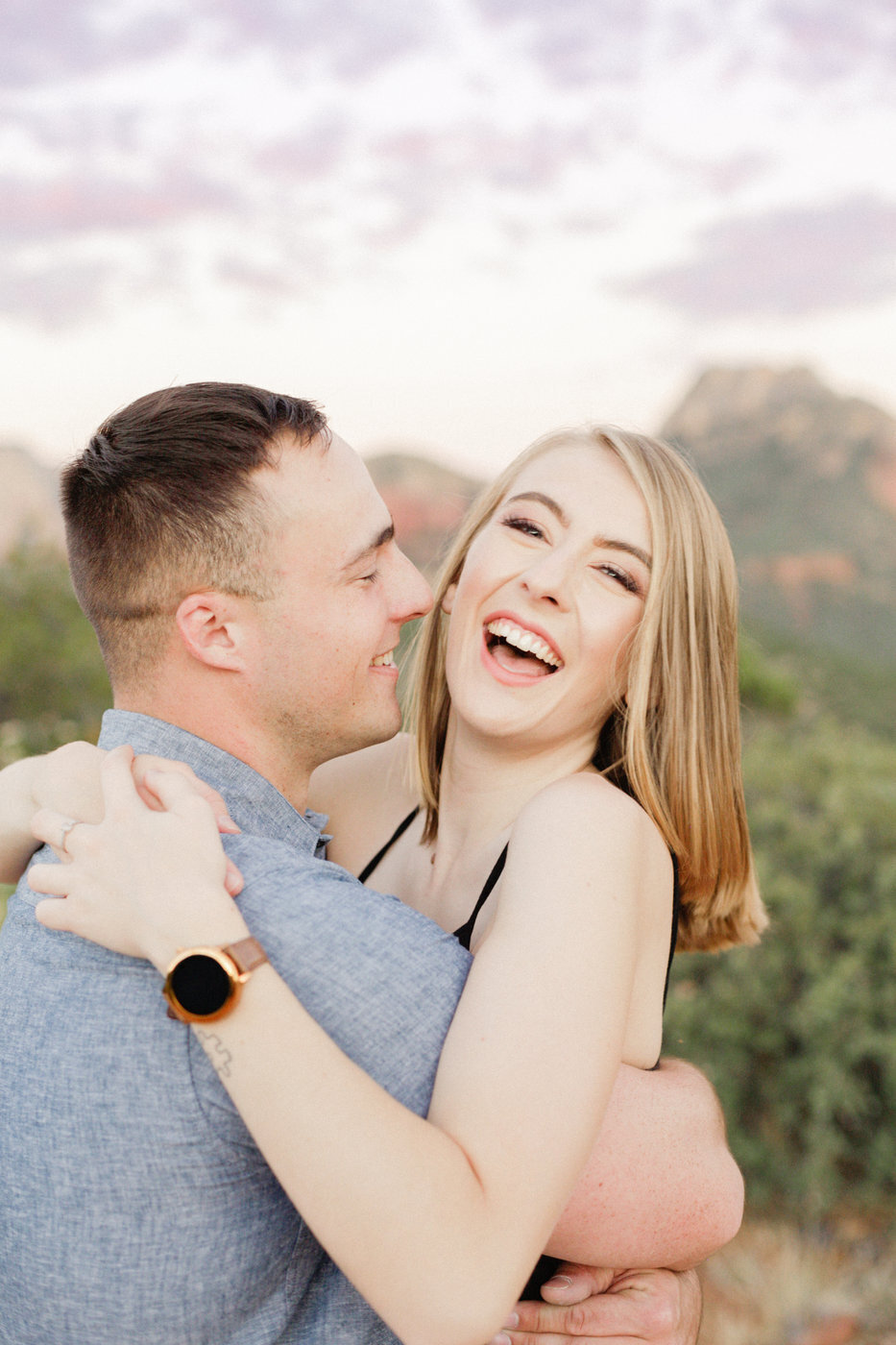 Celebrate your engagement with a romantic photo session at Camelback Mountain in Scottsdale. This gallery showcases the rugged beauty of the mountain, stunning sunset views, and the love shared between a couple in this iconic Arizona location.