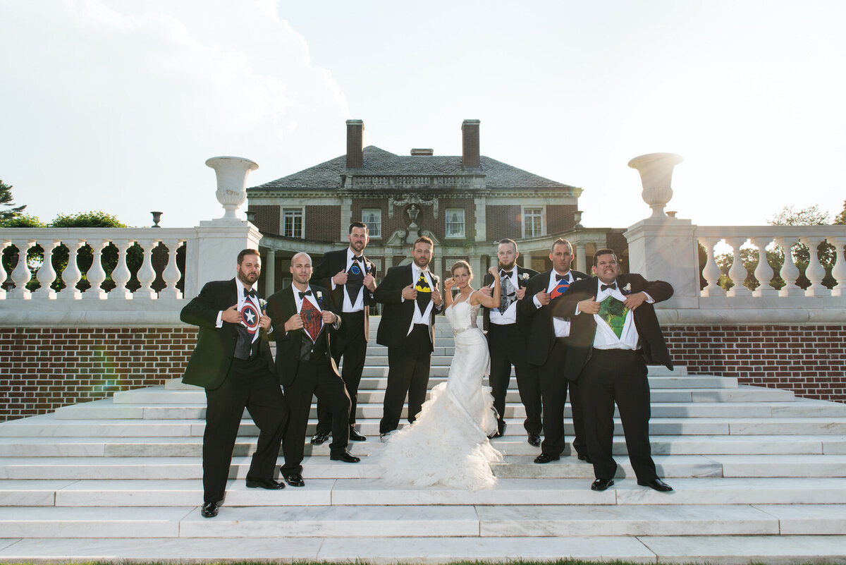 bride and groom with all the groomsmen at de Seversky Mansion