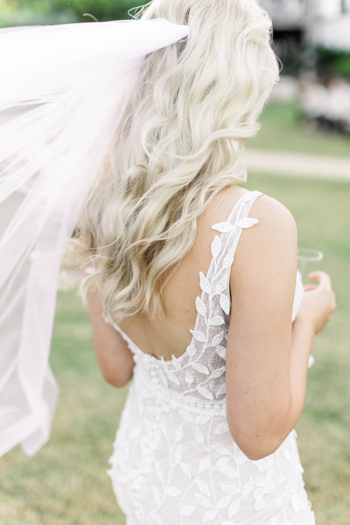 detail photo of bride's delicate wedding dress