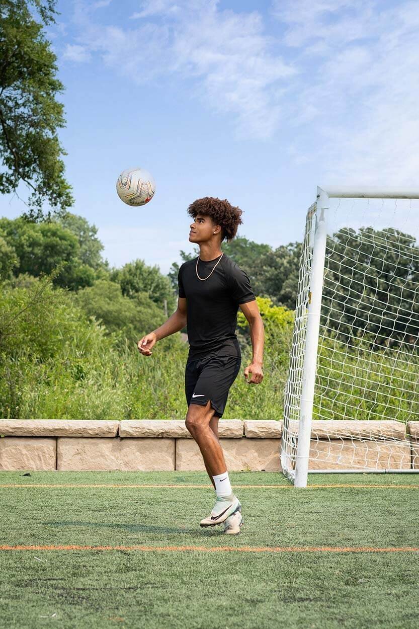 senior-boy-juggling-soccer-ball
