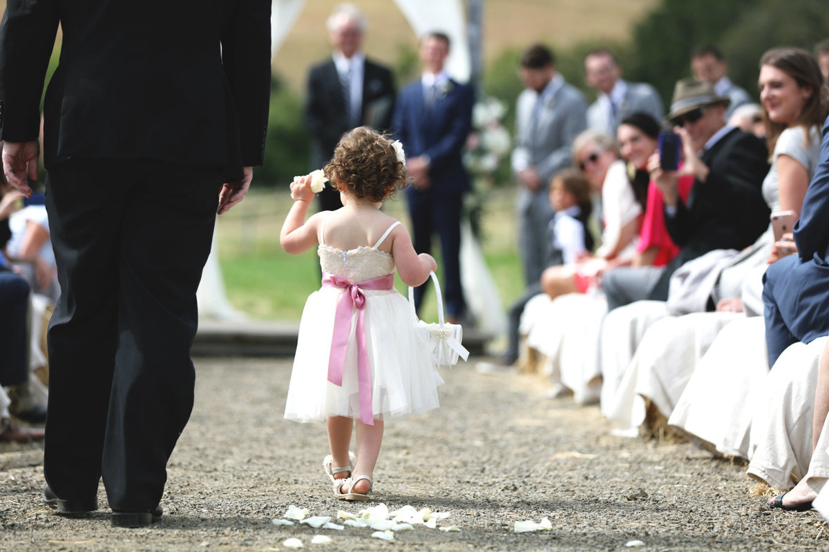 Napa Valley Photographers, the Cute Flower Girl Walking Down the Aisle