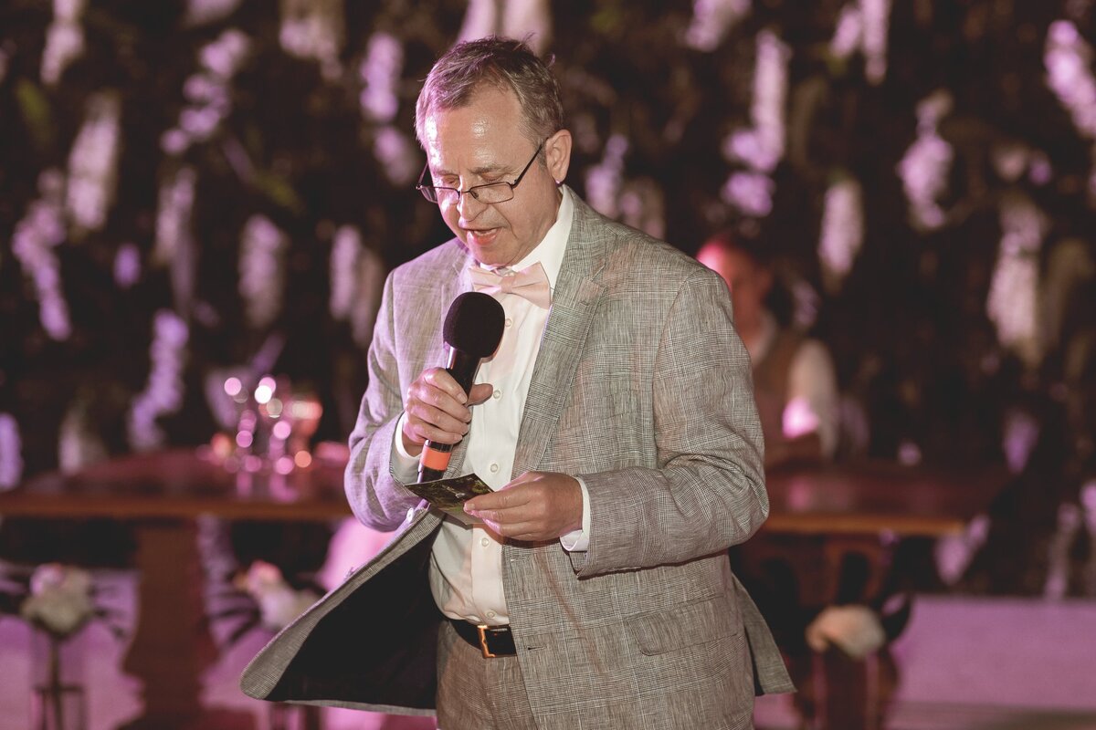 Father of the bride speaking at wedding reception