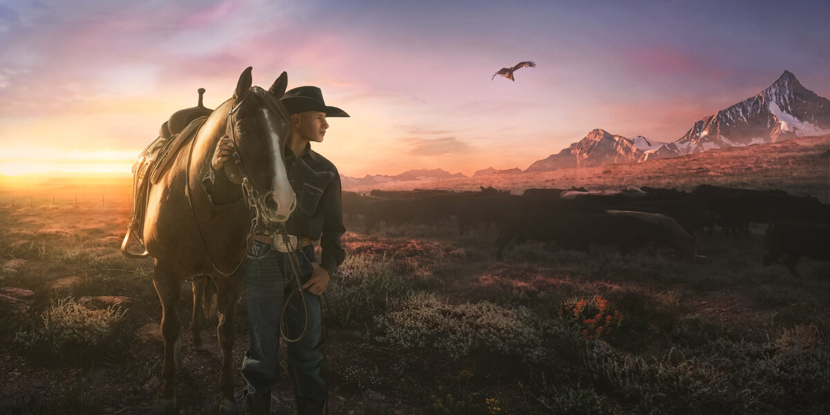 cowboy with horse cattle and mountains sunset