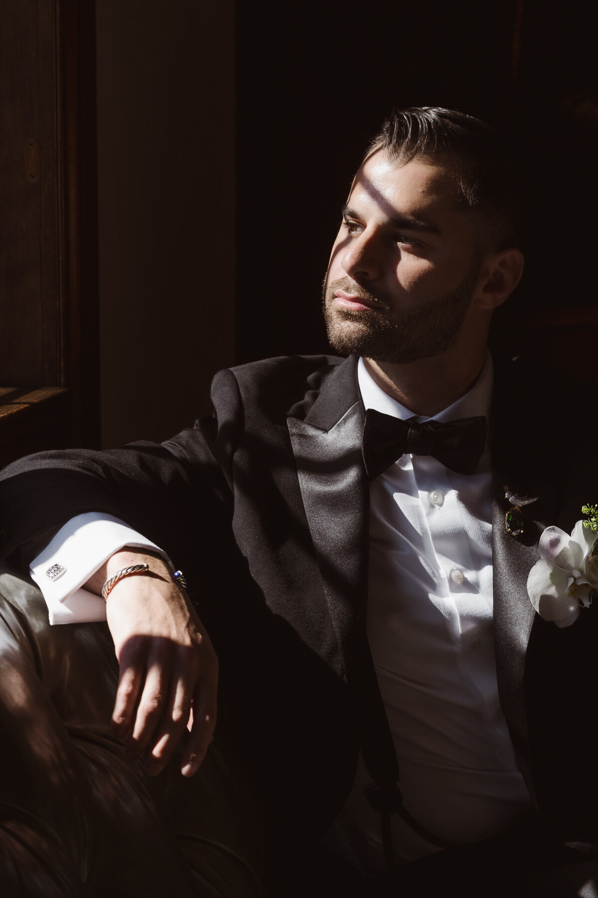 groom portrait with harsh light
