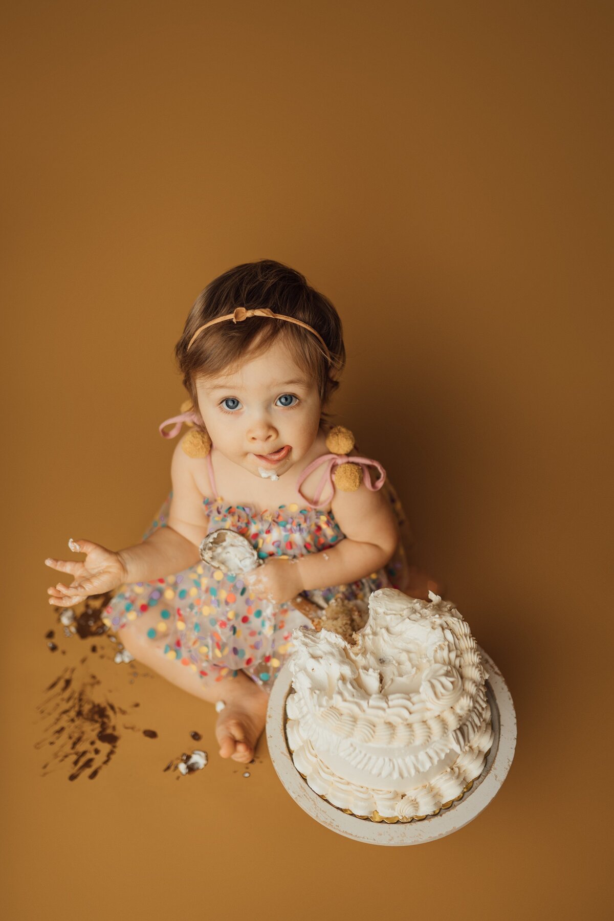 girl eating cake during photography session in apollo beach