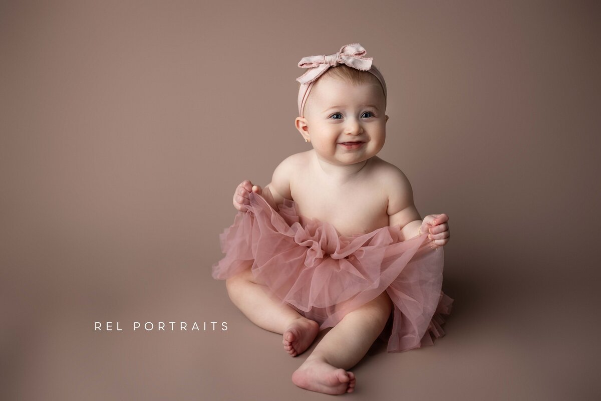1 year old in a tutu