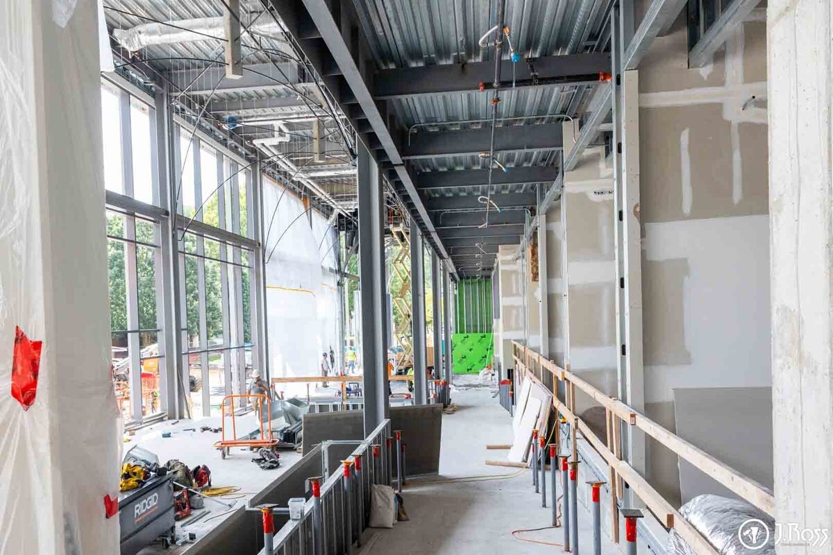 Interior corridor of the ETSU Academic Building showing completed commercial drywall installation by J.Ross.