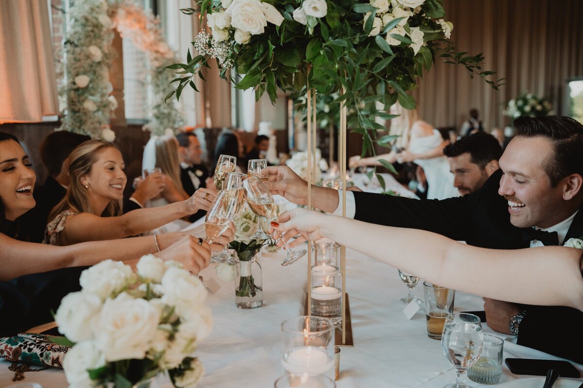 reception-guest-toast-celebration-laugh