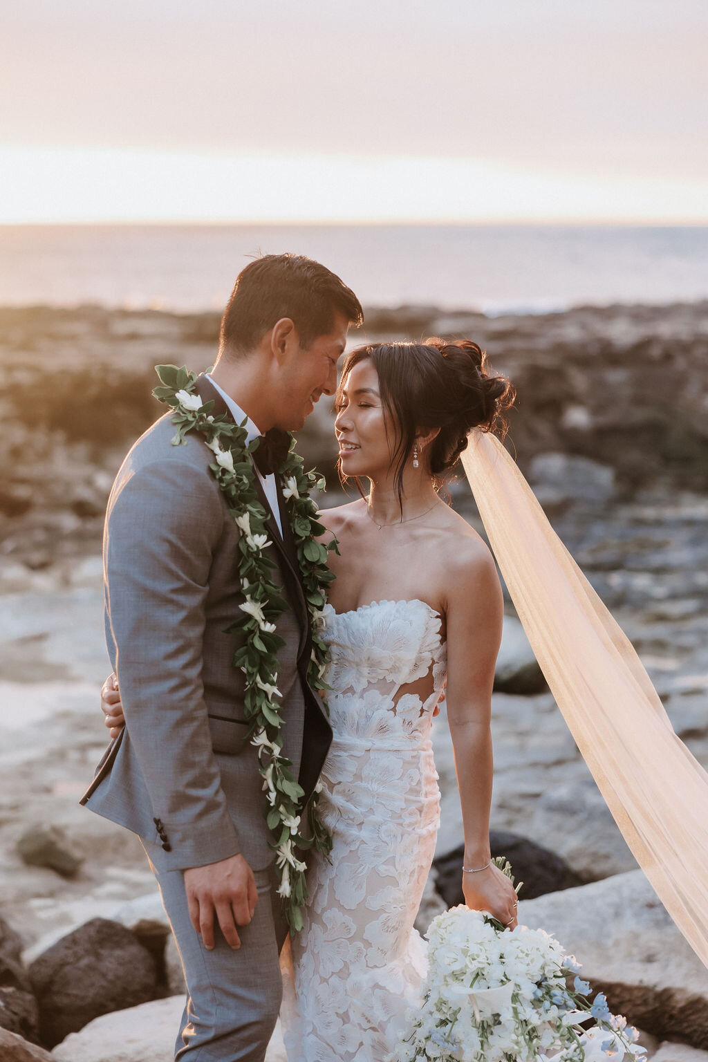 bride and groom sunset photos looking into each others eyes