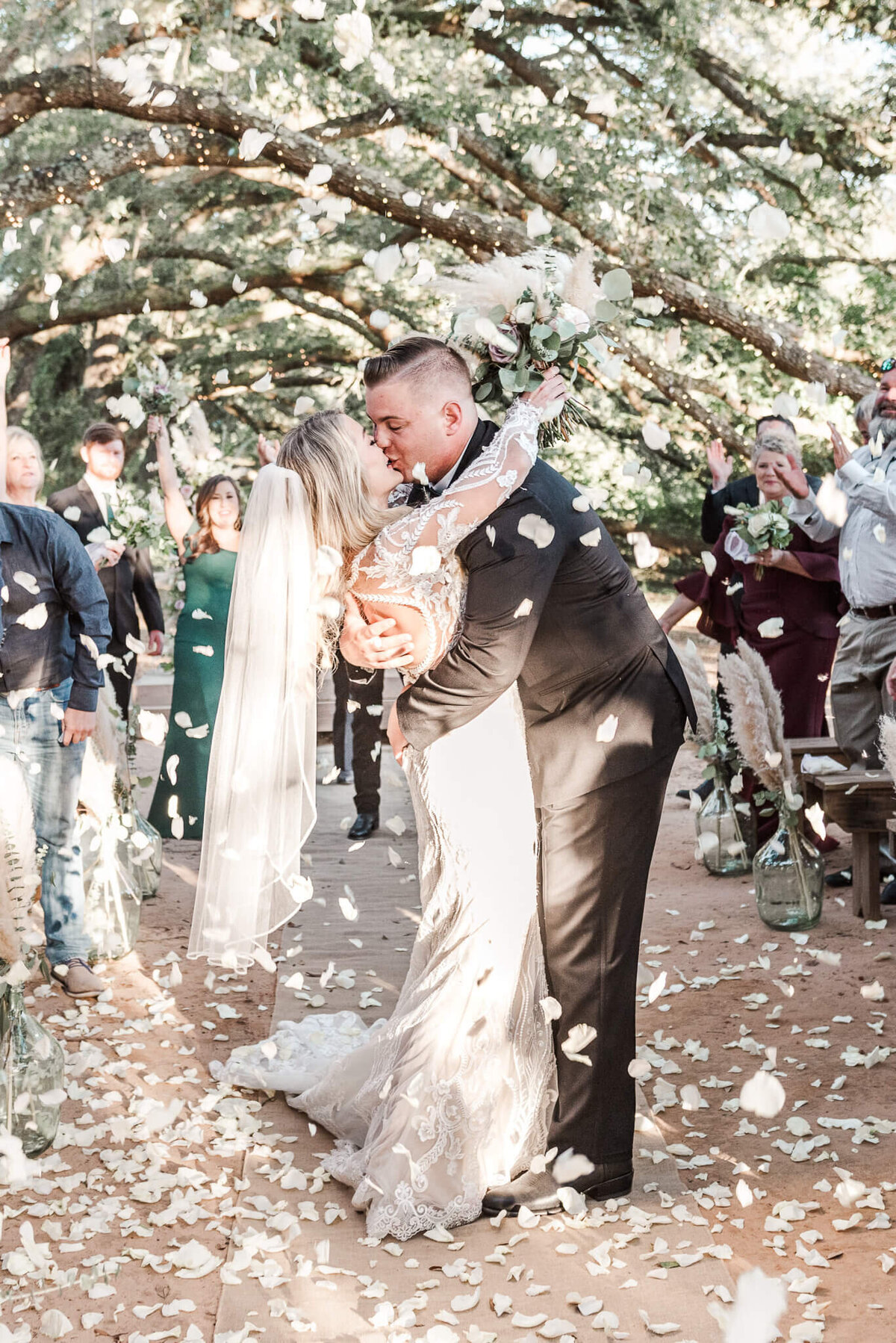 Fairhope-Alabama-Mobile-Birmingham-Pensacola-Florida-Wedding-Photographer-Videographer-Oak-Hollow-Farm-Travis-Ralyn-Groomsmen-Ceremony-Rose-Petal-Toss-Bride-Groom-Dip-Kiss-2