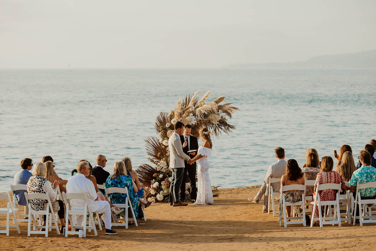 bride-and-groom-marrying-on-beach