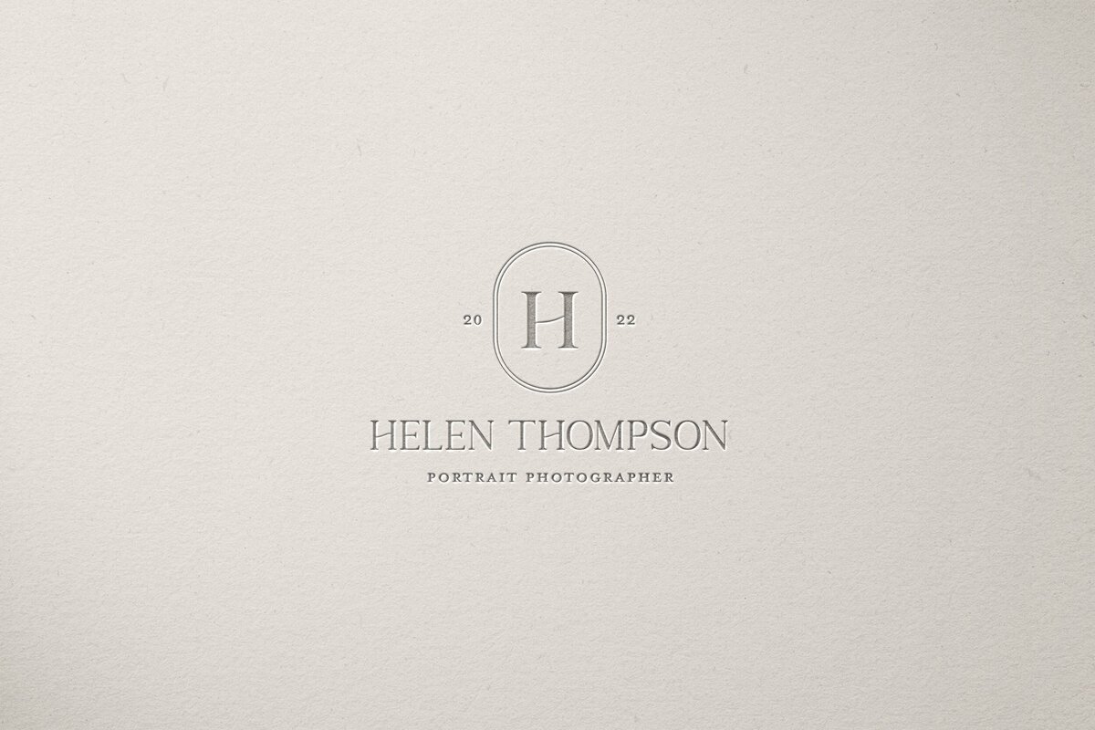 elegant embossed logo design for portrait photographer.