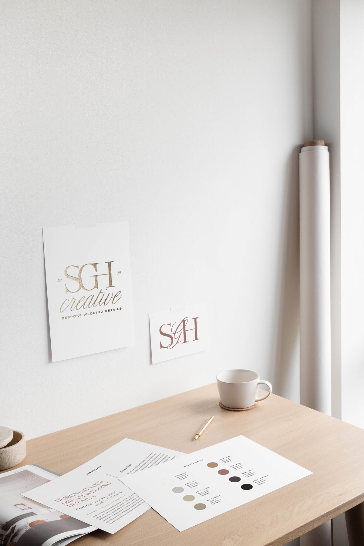 Two female business owners working on laptop and making notes