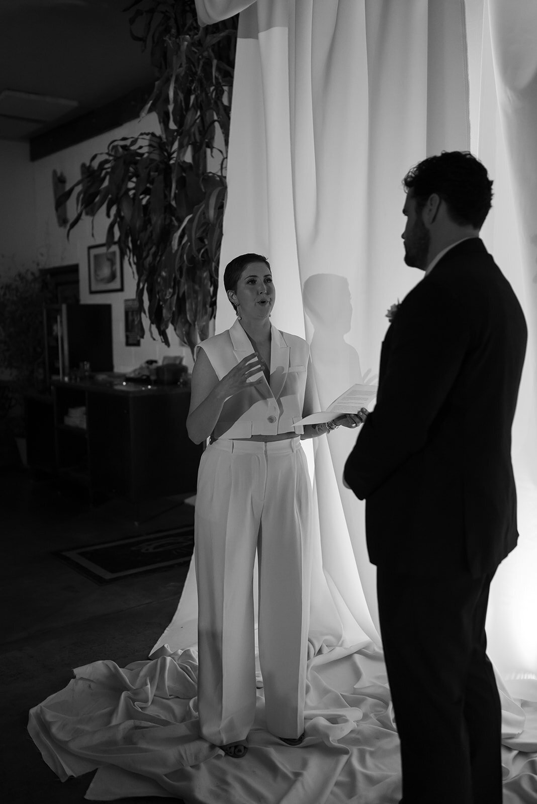 A couple renew their vows at an intimate indoor ceremony planned by Perfect Thirds and Co. 
