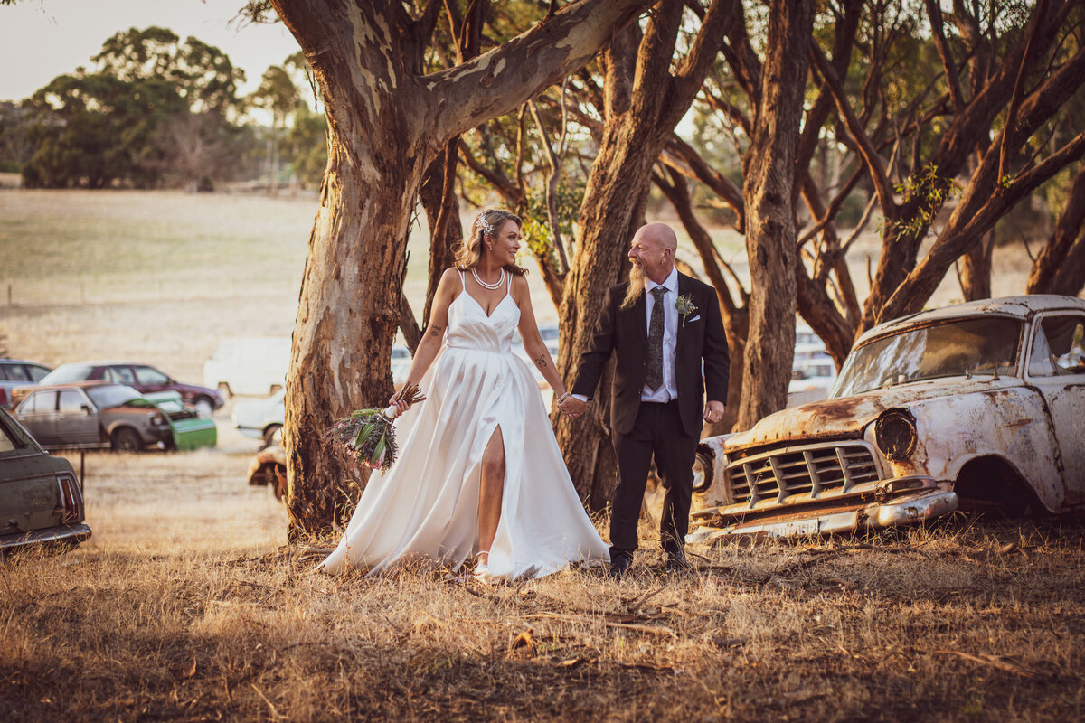 Experience the joy and love of a newlywed couple with JakeyVass Media / JakeyVass Weddings. This image captures the happiness and excitement of your wedding day. Visit www.jakeyvassmedia.com.au to explore our portfolio and book your wedding photography session.