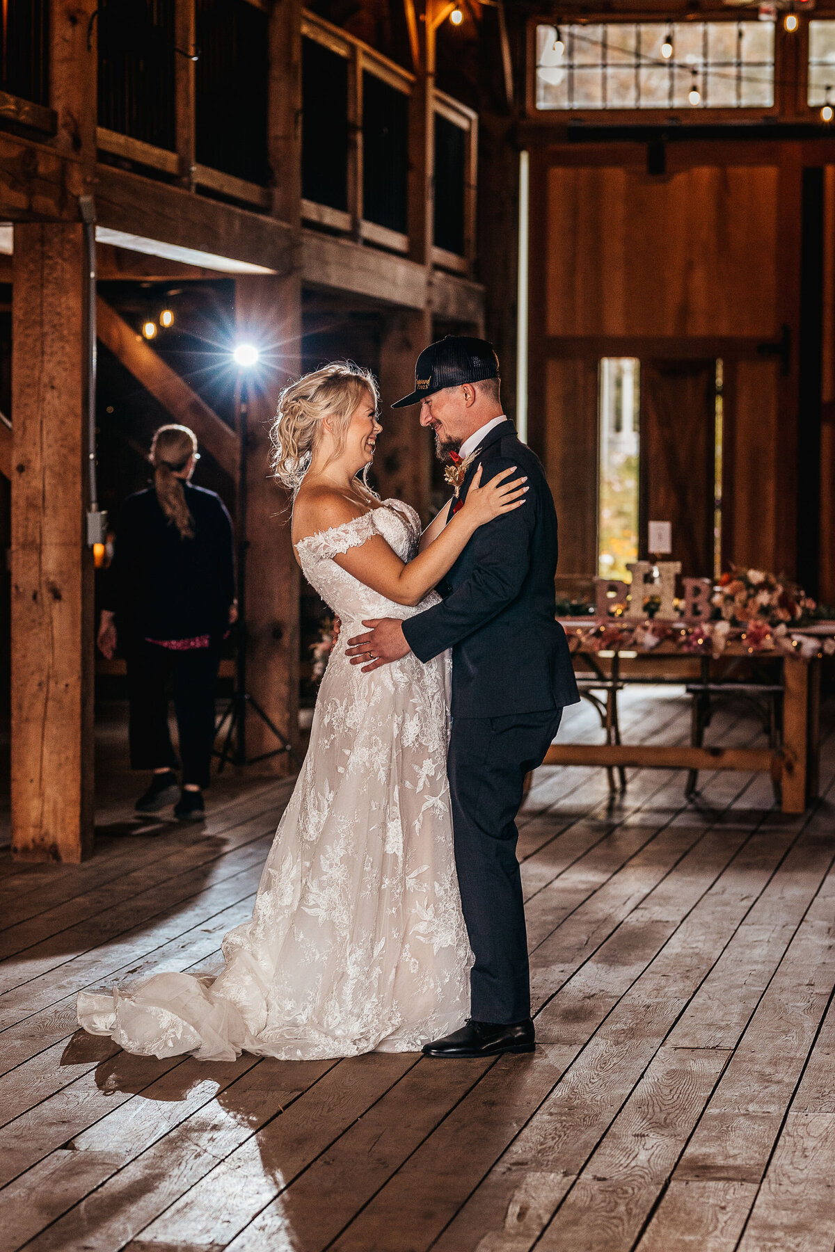 First dance between bride and groom at beautiful barn wedding at Sanborn Hill Farm in Sanborn NH by Lisa Smith Photogrpahy