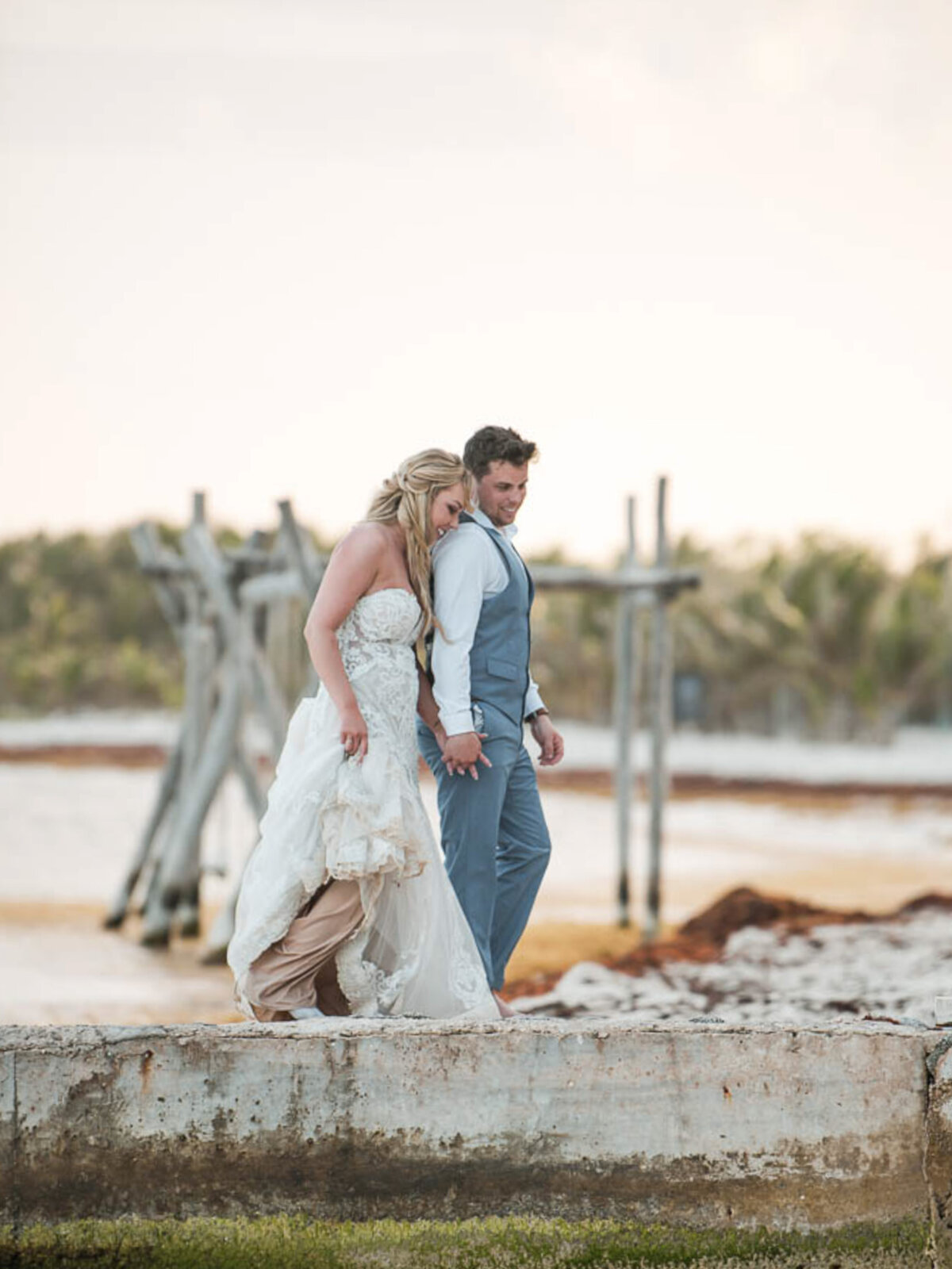 a bride and groom at El Dorado Seaside suites in Cancun