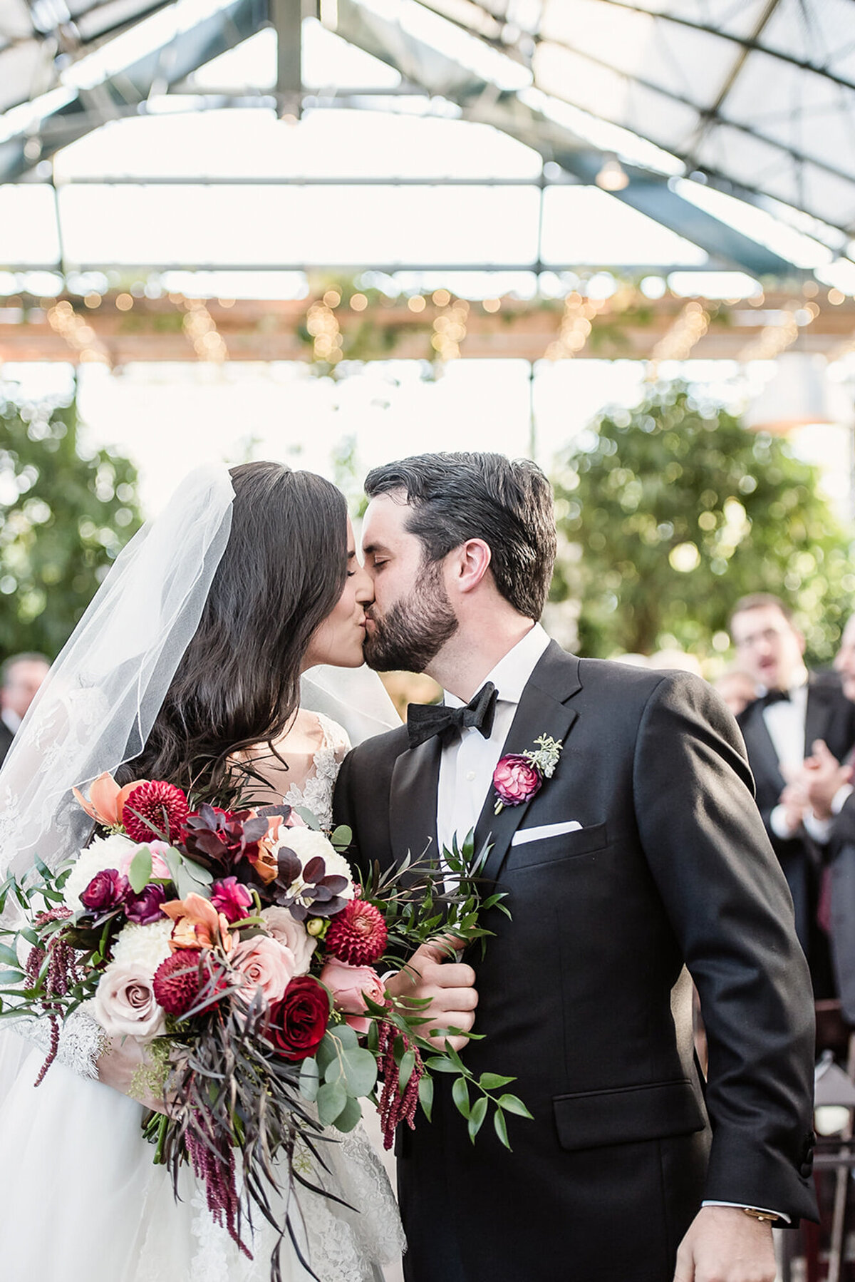 An elegant black tie garden wedding at Planterra Conservatory in West Bloomfield Michigan provided by top rated Metro Detroit wedding photographer Kari Dawson12