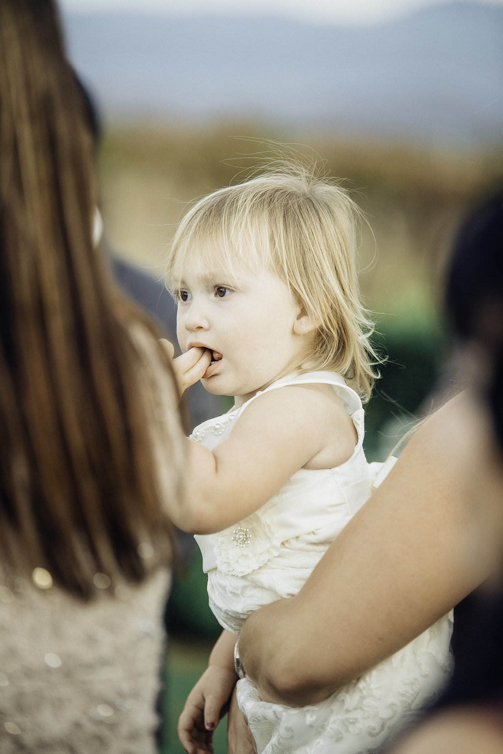 Wedding Photograph Of a Baby Girl in White Dress Los Angeles