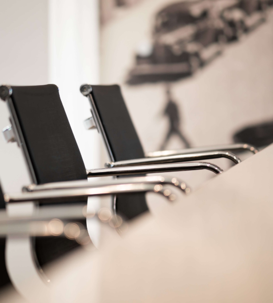 chairs next to table in conference room