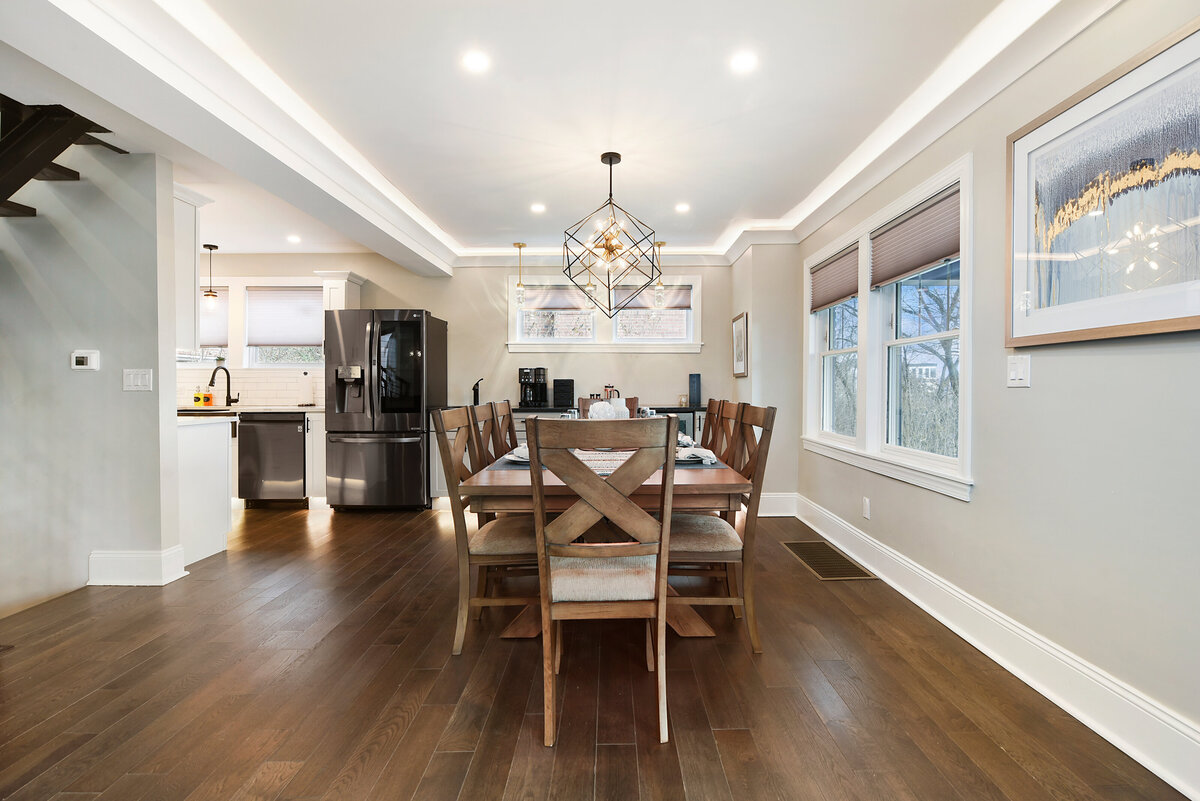 Professionally staged dining room designed to maximize home value and buyer appeal