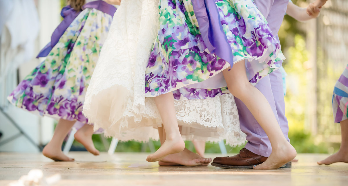 Children dancing around bride and groom at Rancho Soquel