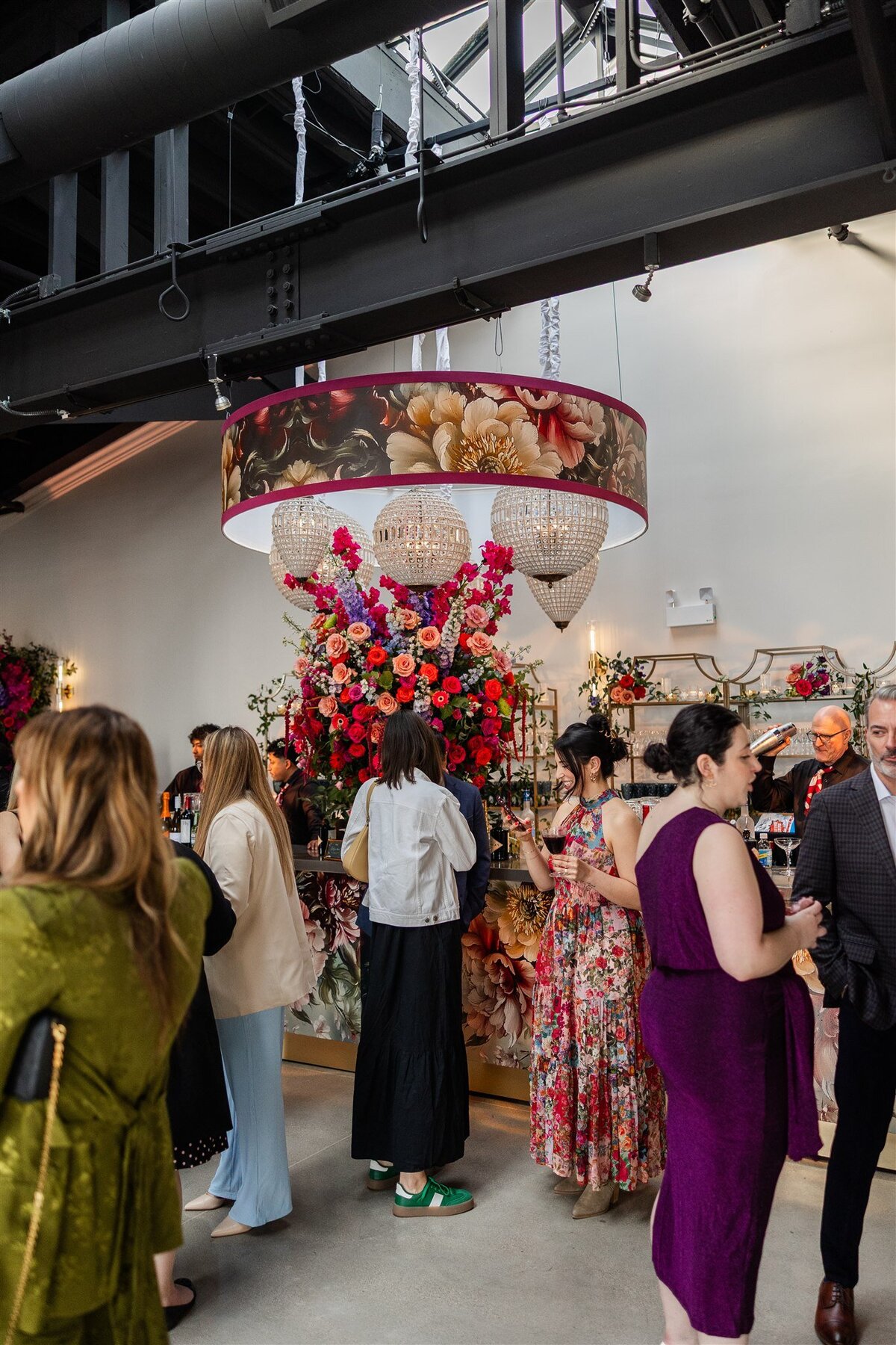 Event space styled with a Baroque theme, featuring ornate gold accents, rich fabrics, grand chandeliers, and intricate moldings, creating a luxurious and dramatic atmosphere