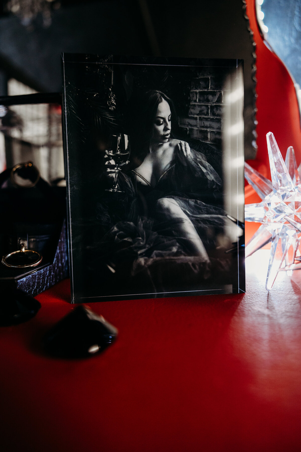 Boudoir photography keepsake image on red chair in Lubbock, Texas photographer in Amarillo TX