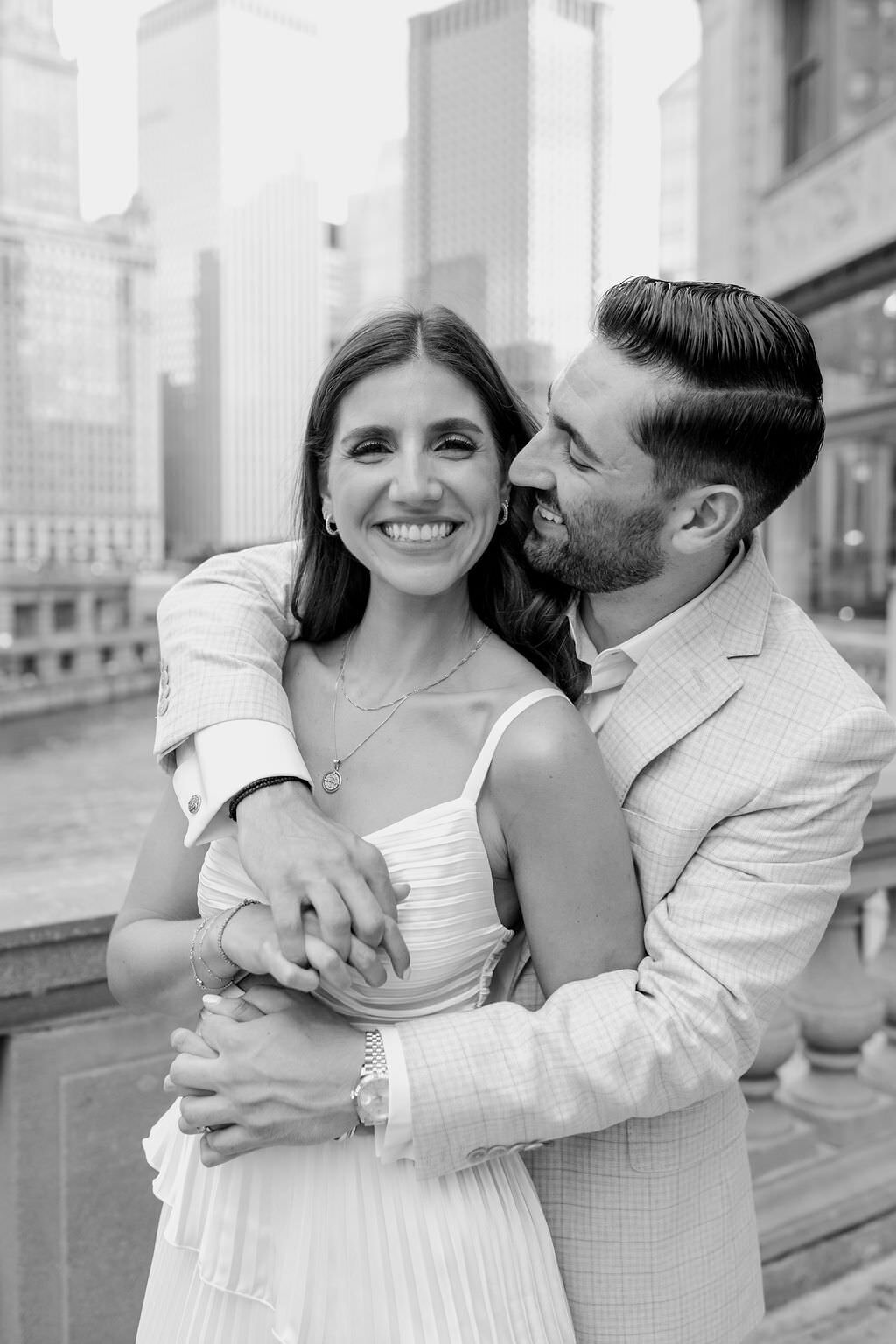 An engagement photography session at The Wrigley Building and North Ave Beach in Chicago, Illinois - 16
