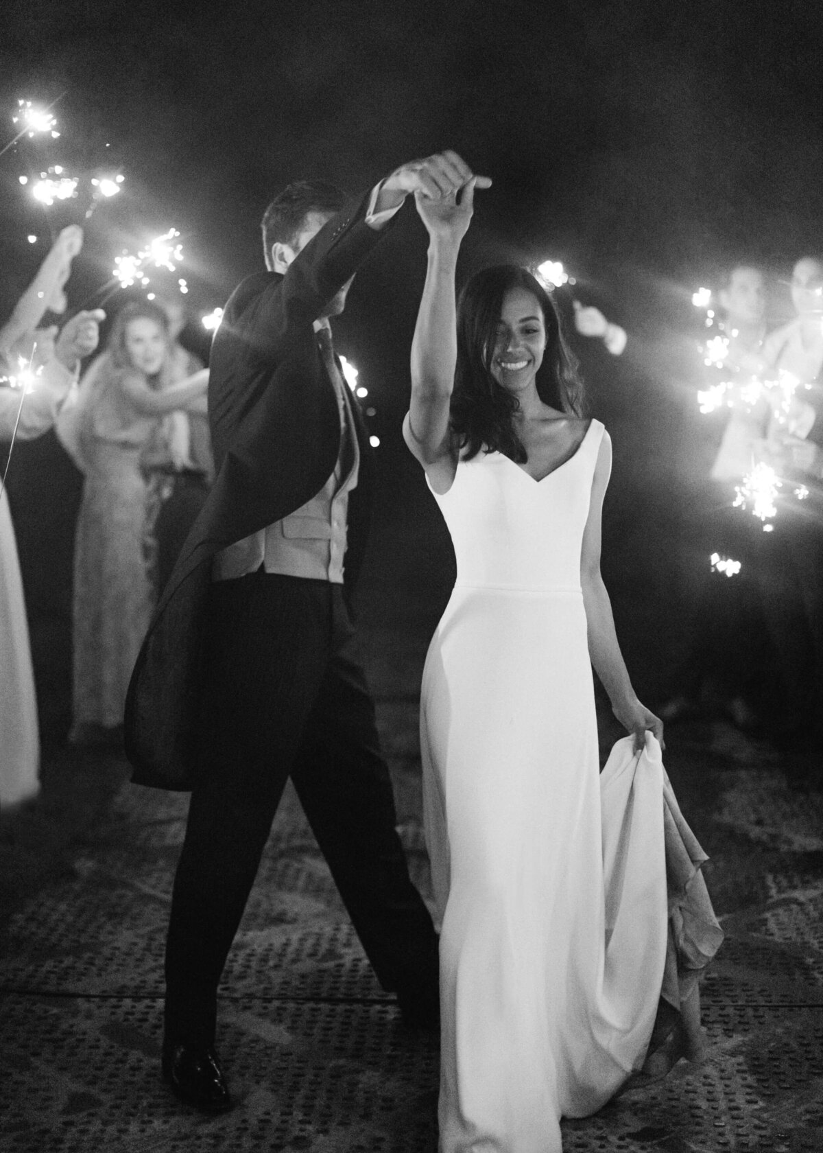chloe-winstanley-weddings-sparklers-bride-groom-spin