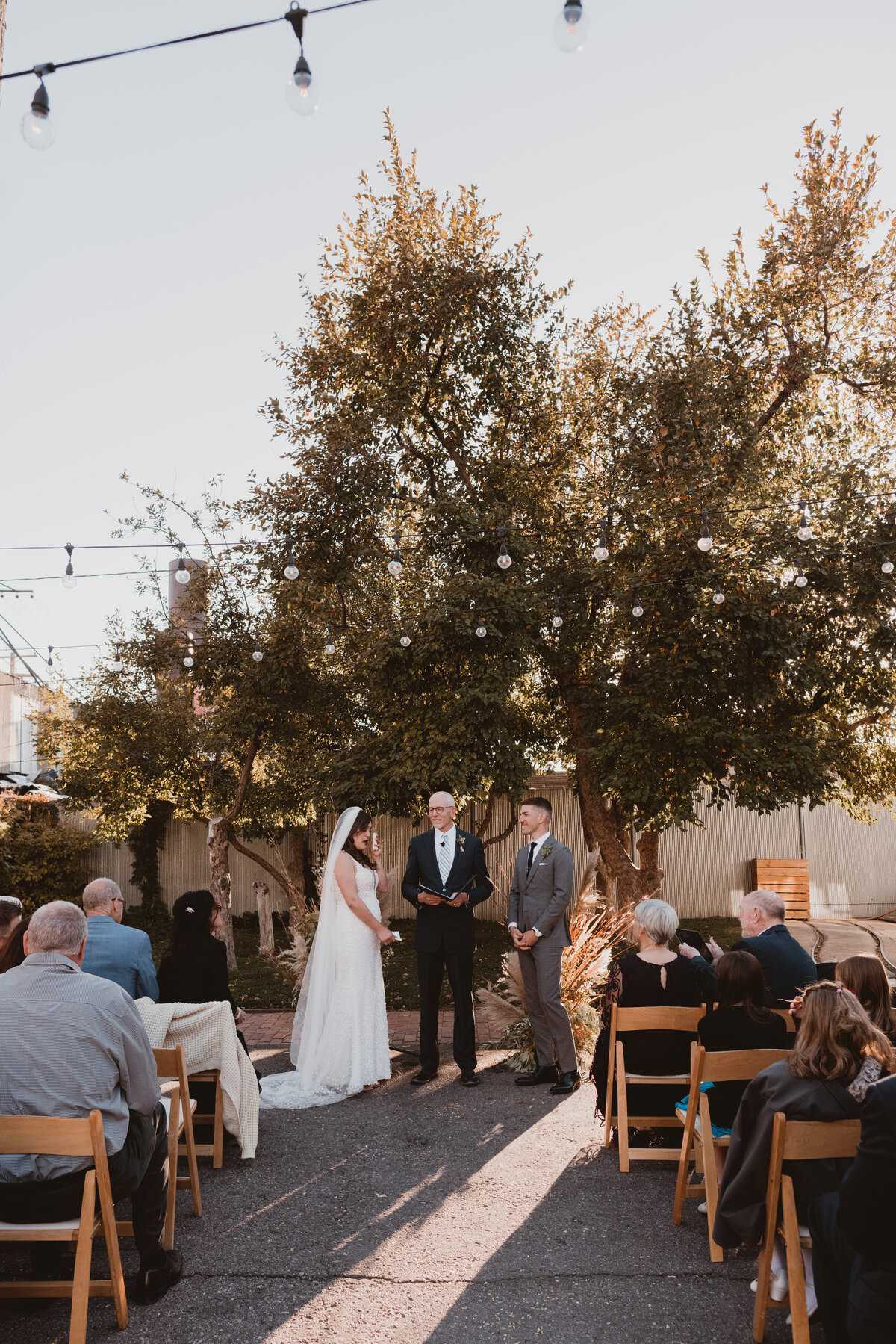 Bride and groom during their wedding ceremony at Blanc in Denver, Colorado.