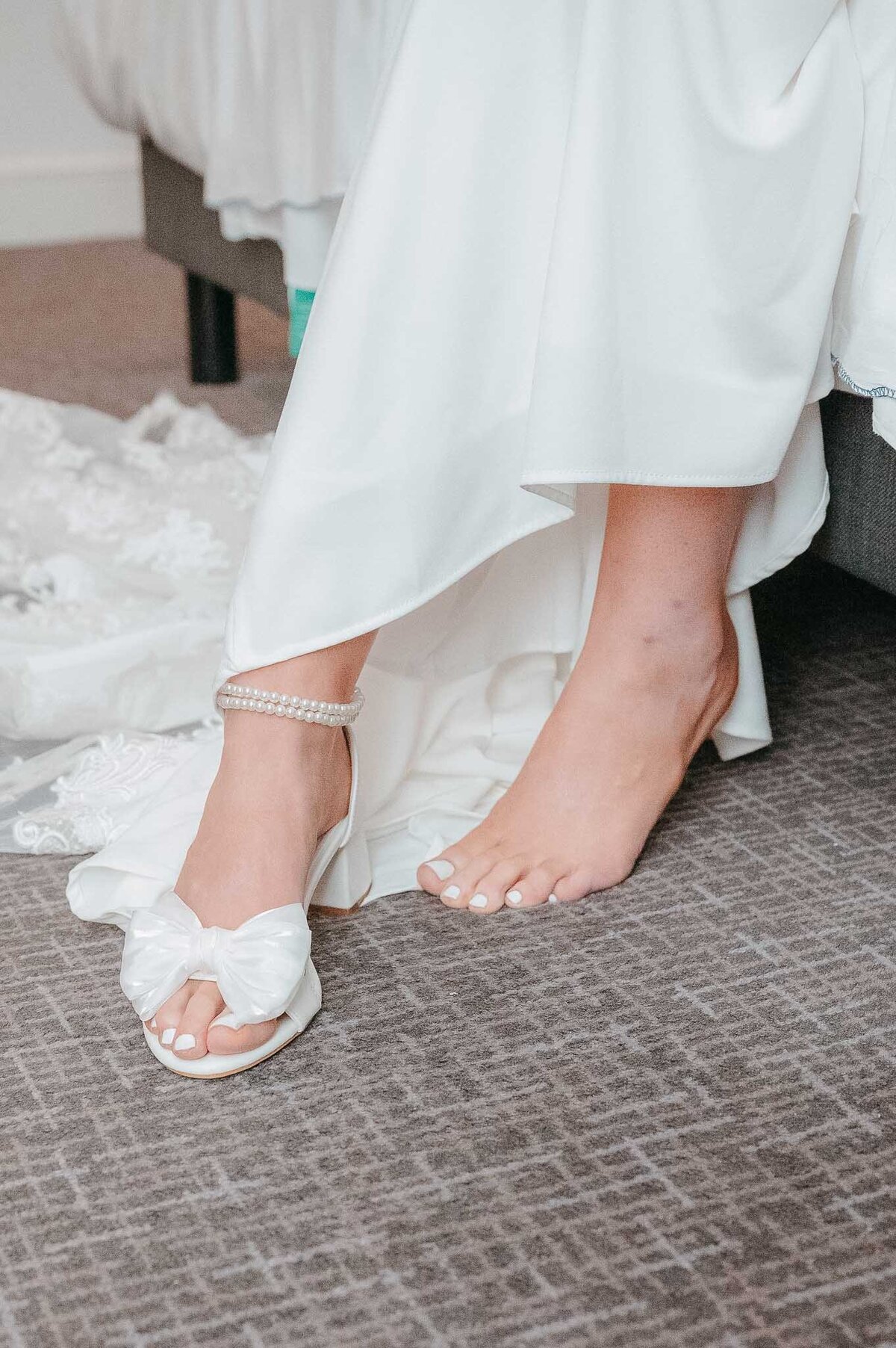 Close-up of bride’s wedding shoes with ankle strap detail, bridal prep in Liverpool. 