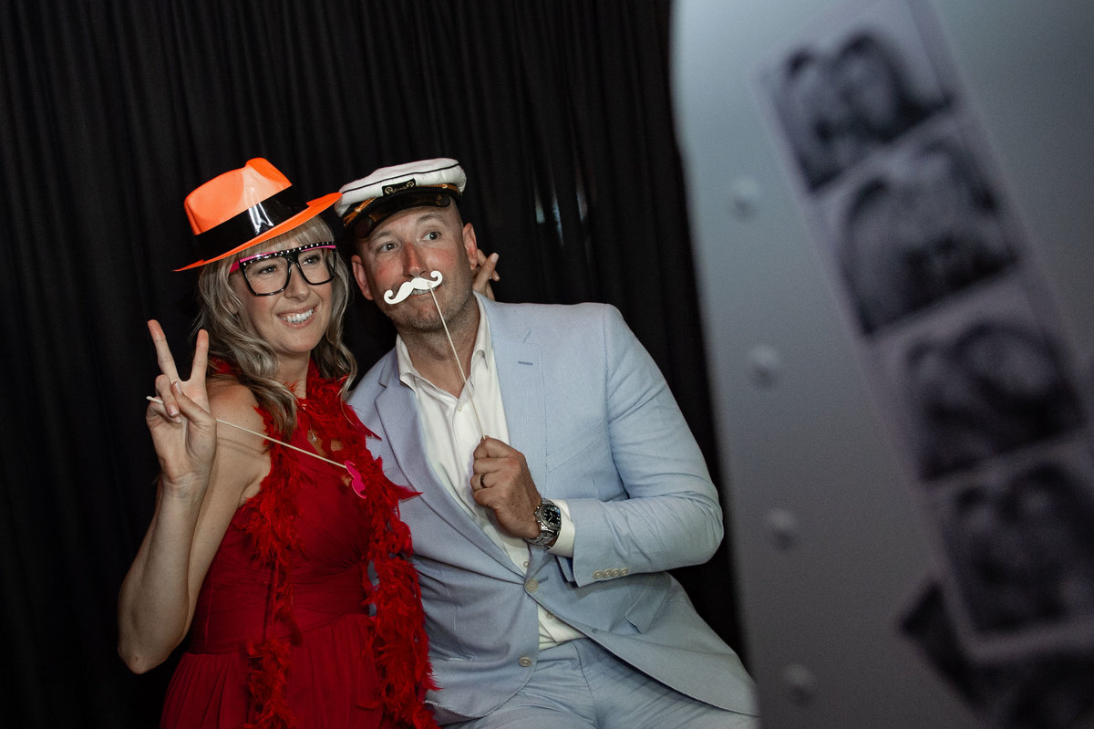 guests pose silly in photo booth