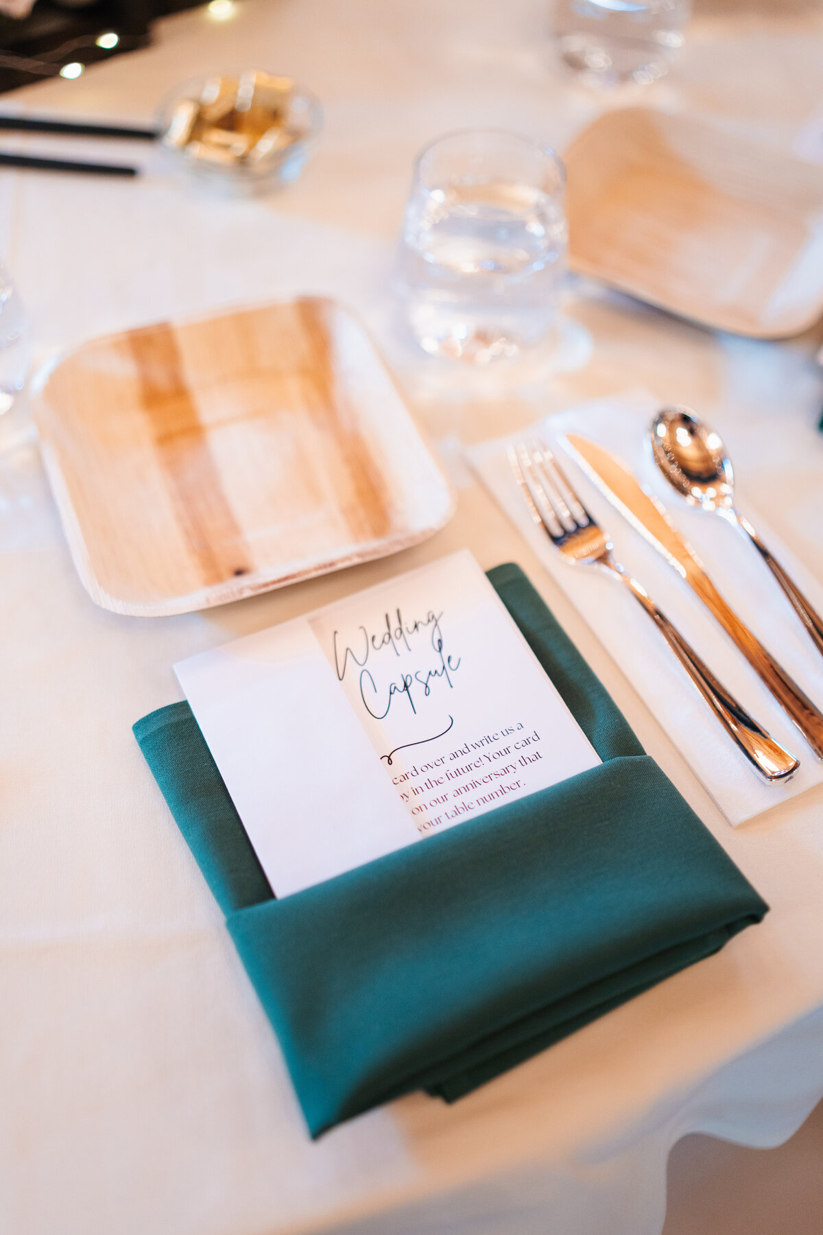Rustic wedding details with greenery and neutral tones