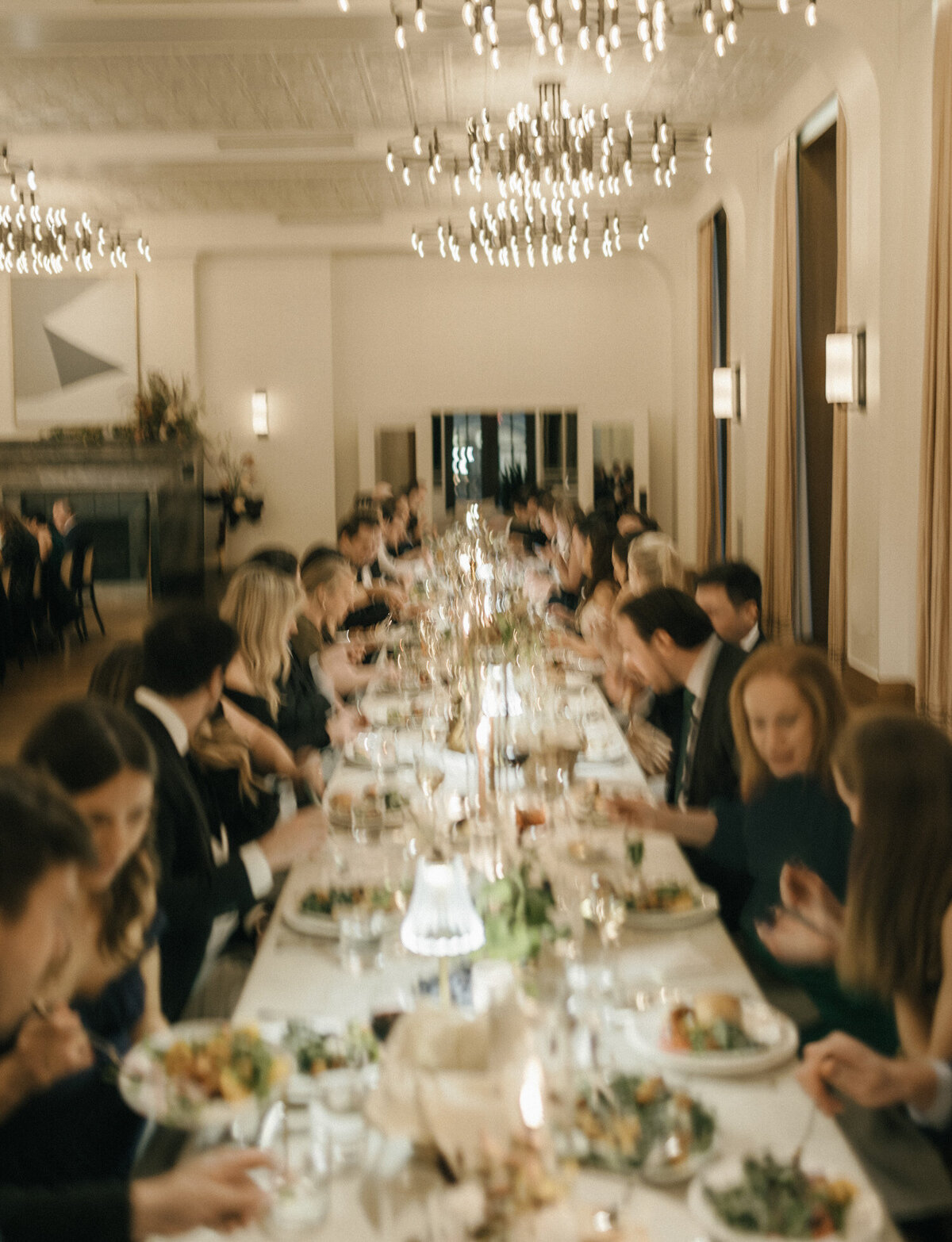 soft movement wedding photography of Shinola Hotel wedding reception, wedding dinner photos