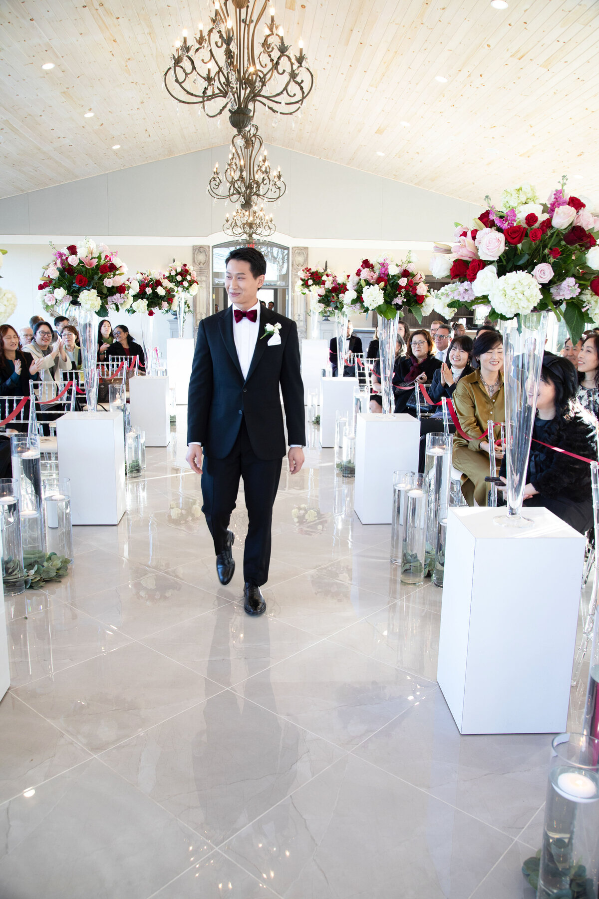 Groom-Walking-Down-Aisle-Tate-House-Ceremony-Hal