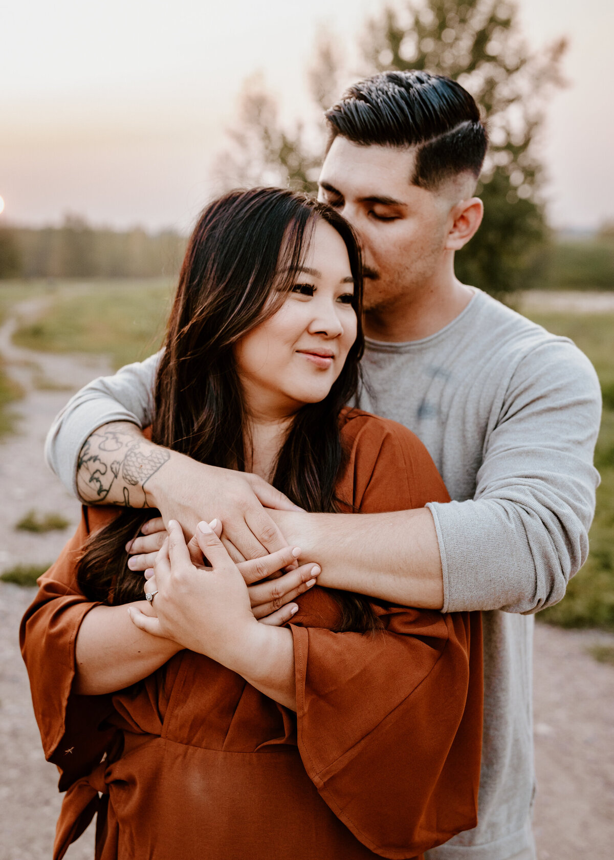 Husband holding wife