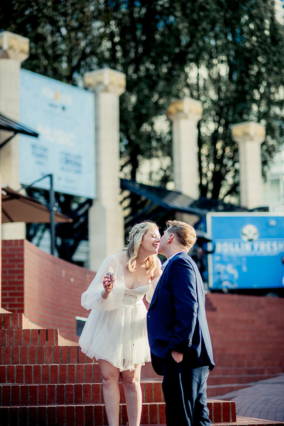 couple kissing on steps