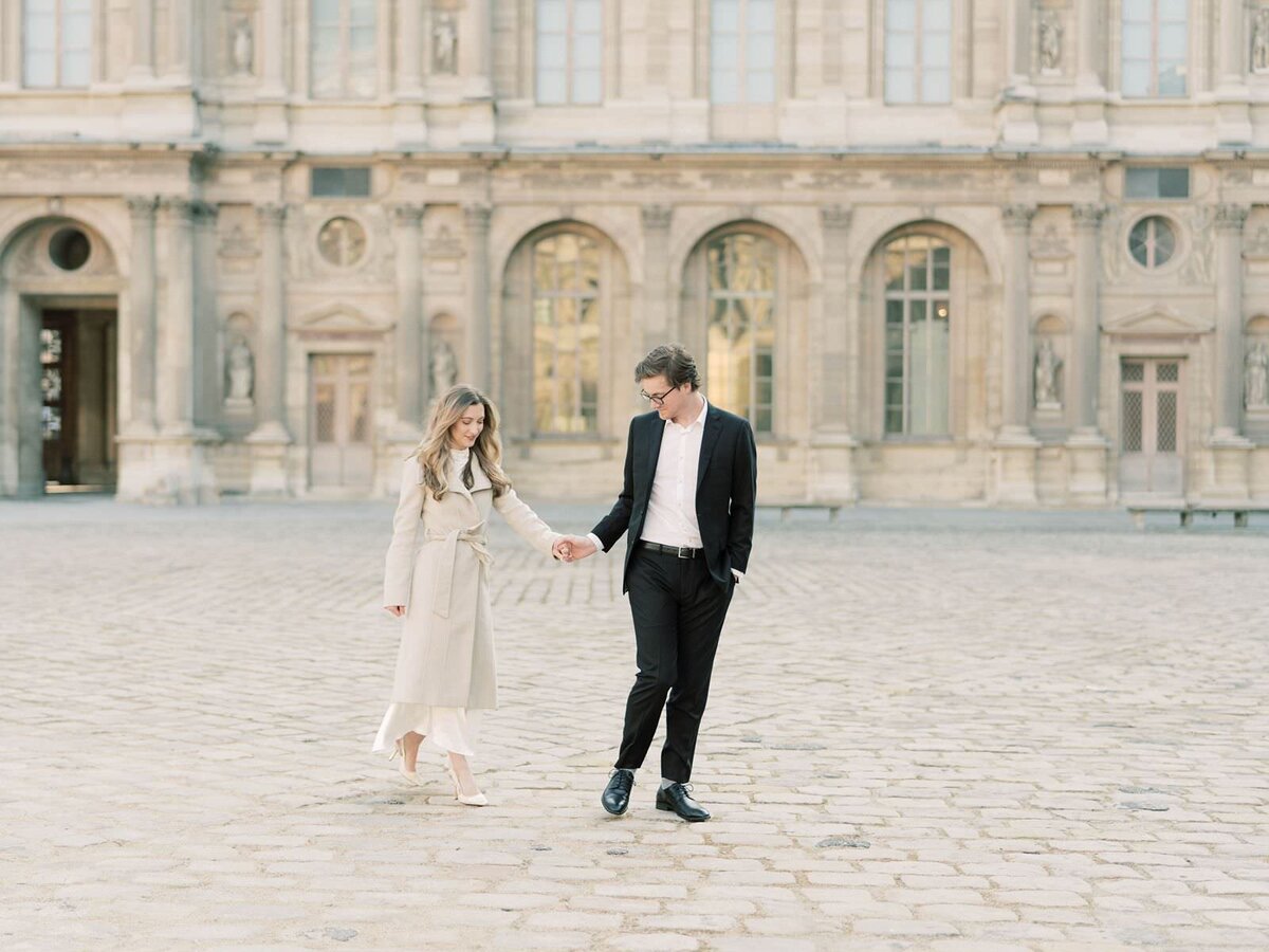 couple-at-engagement-session-at-the-louvre-with-sarah-sunstrom-photography