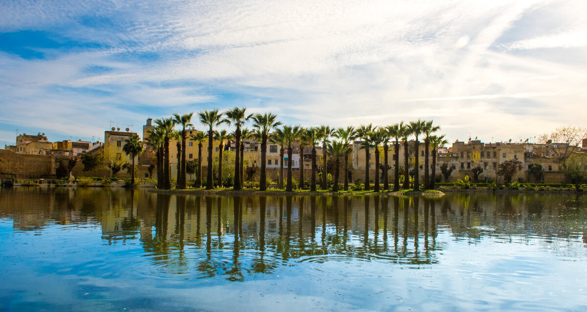 Waterstone - Travelive - Morocco - Luxury Destination Management Company - Royal Park in Fez with lake and palms, Morocco