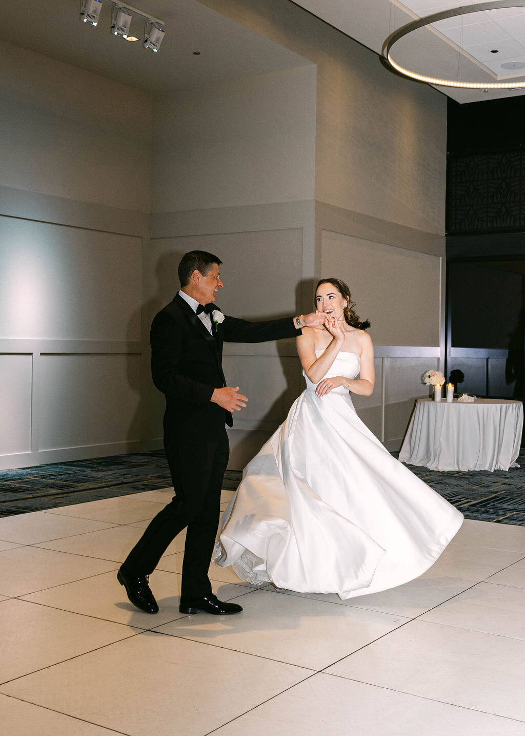 Bride and father dancing during reception at Biltmore wedding.