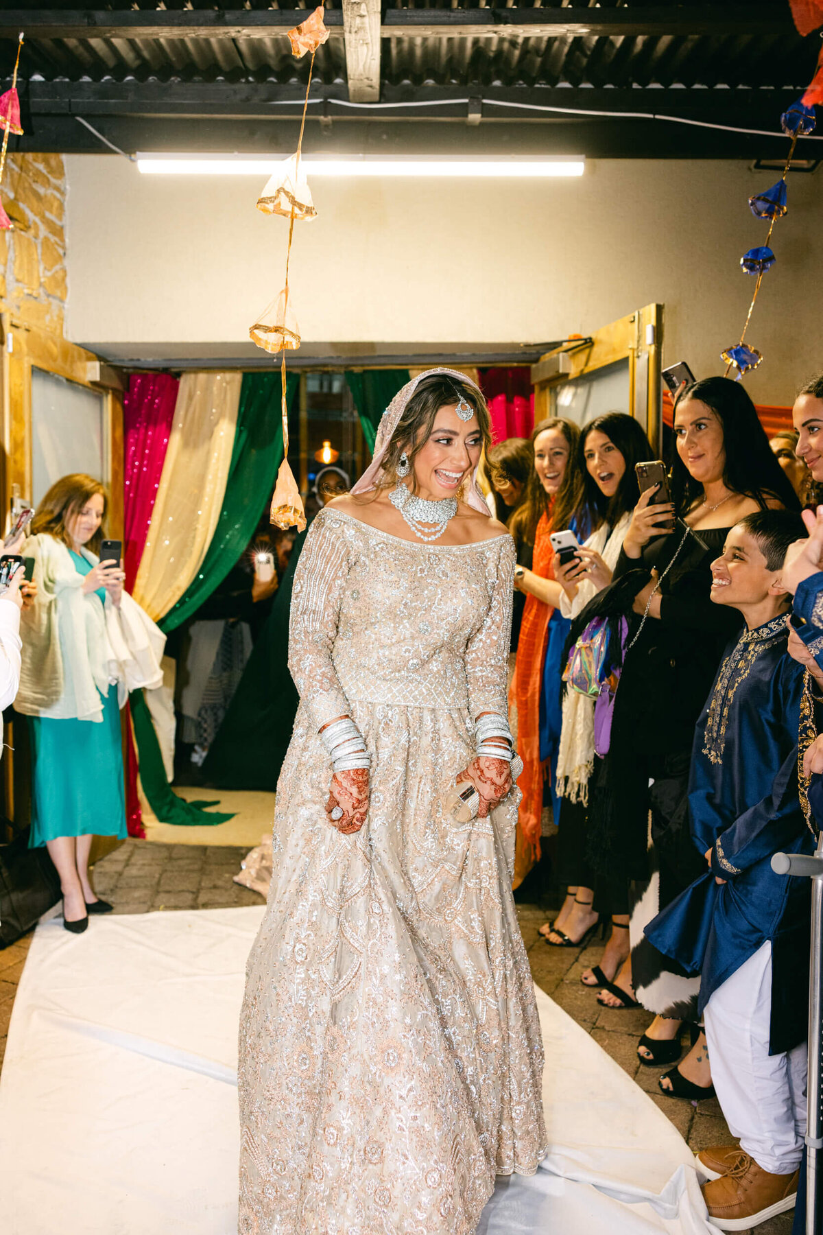 A wedding photo of the bride walking to the ceremony in Dublin Ireland