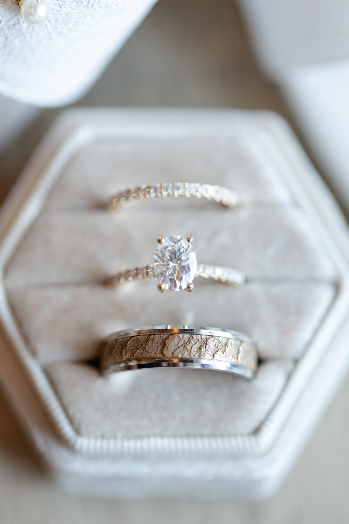 Detail shot of bride and groom's rings
