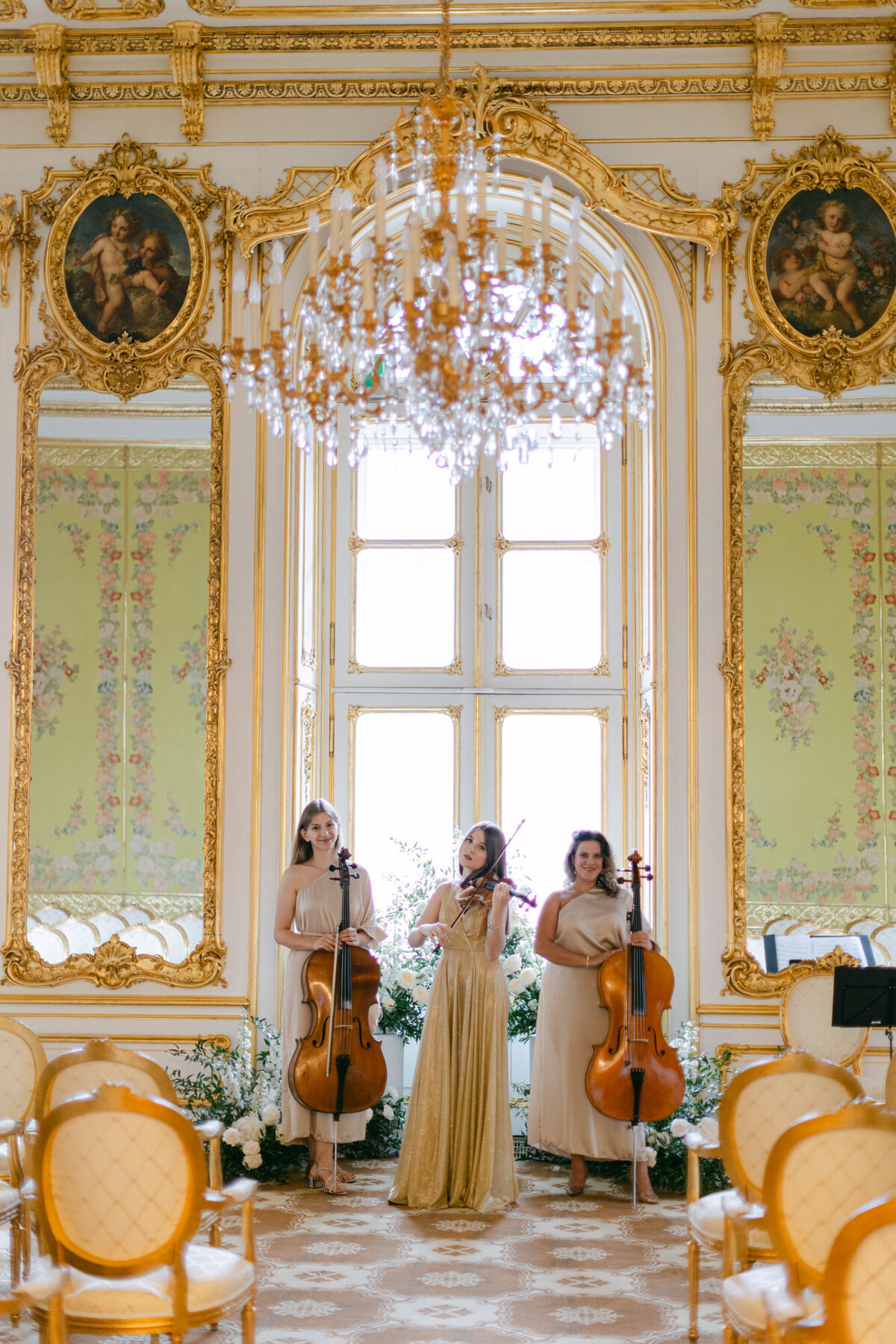 Cello artists at majestic palace Coburg playing life at the destination wedding ceremony organized by ECLAT Destination Weddings