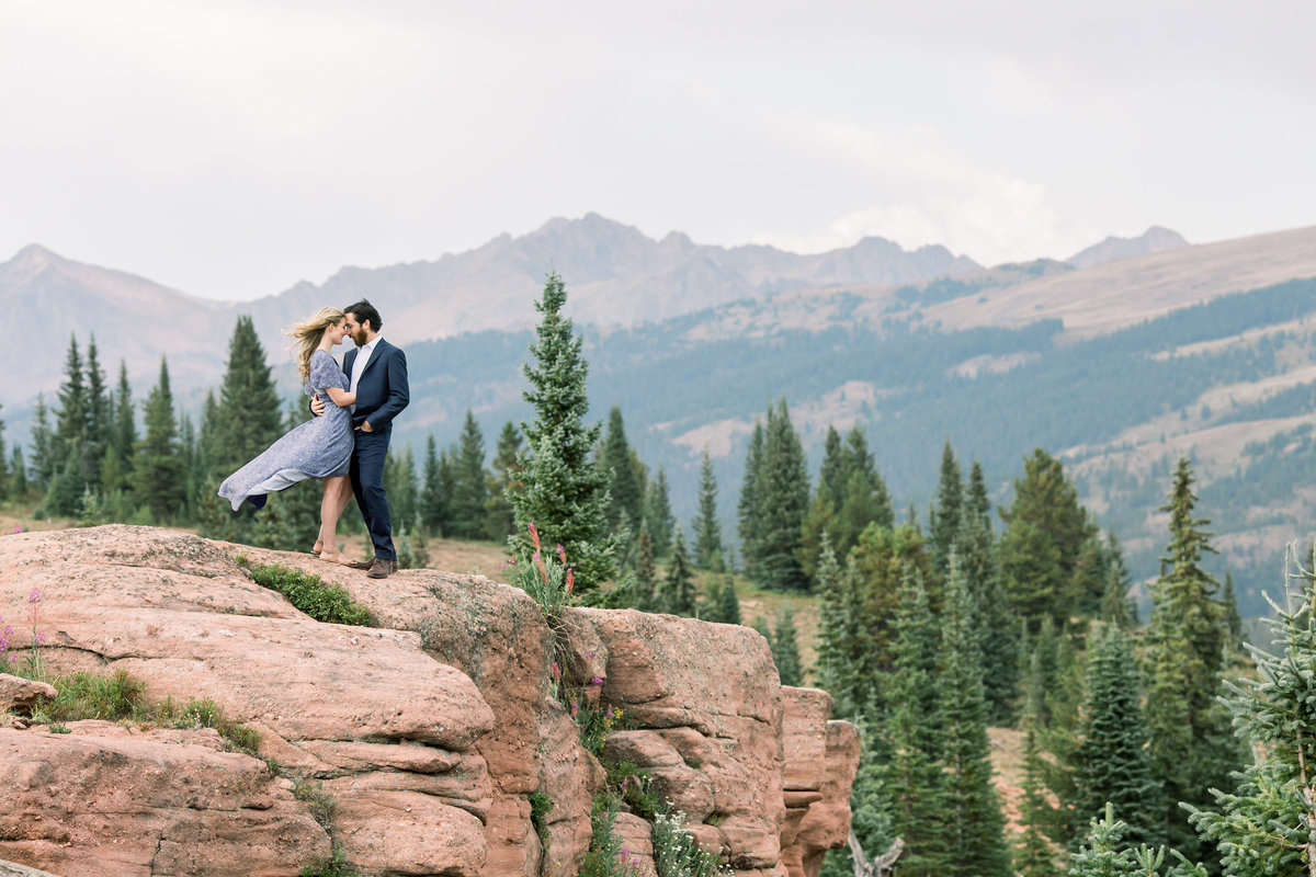 Epic engagement photo on top of Colorado mountain