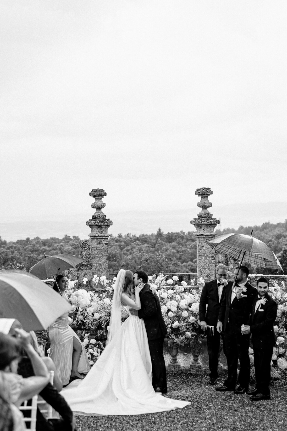 First kiss as husband and wife in Tuscany  wedding